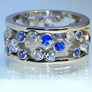 BLUE TOPAZ / WHITE TOPAZ BEZEL SET STERLING CIGAR BAND RING SIZE 10/